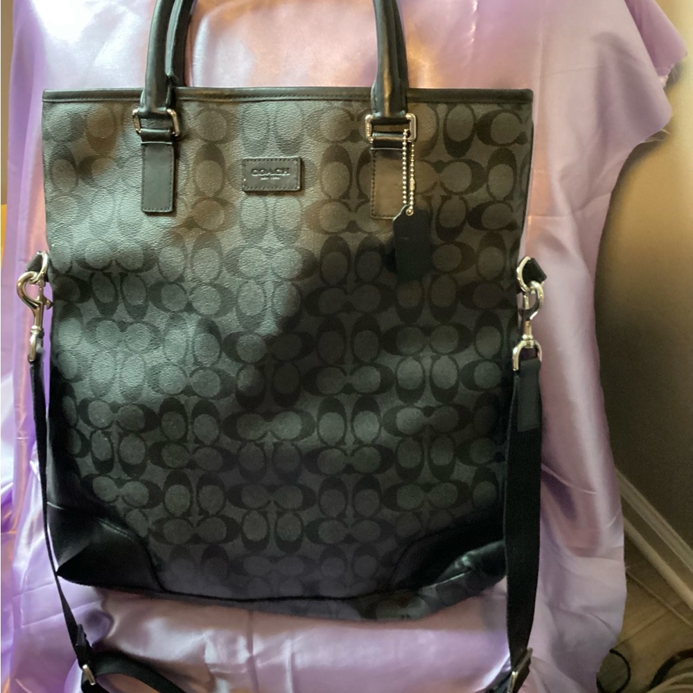 Black monogrammed Coach men’s bag